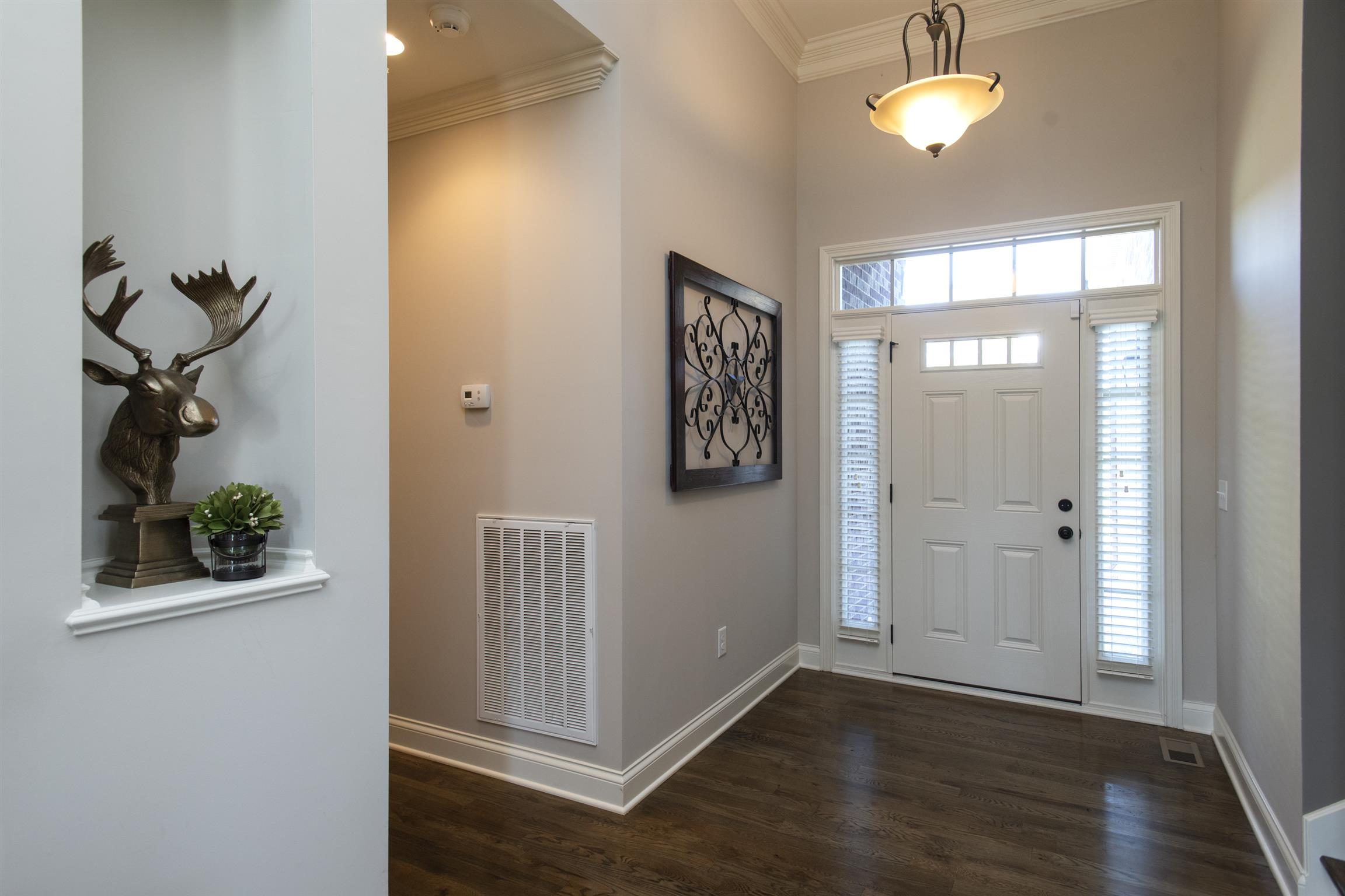 580 Academy Road Lebanon, TN 37087 - Photo 6 of 30 a view of a hallway with wooden floor and closet
