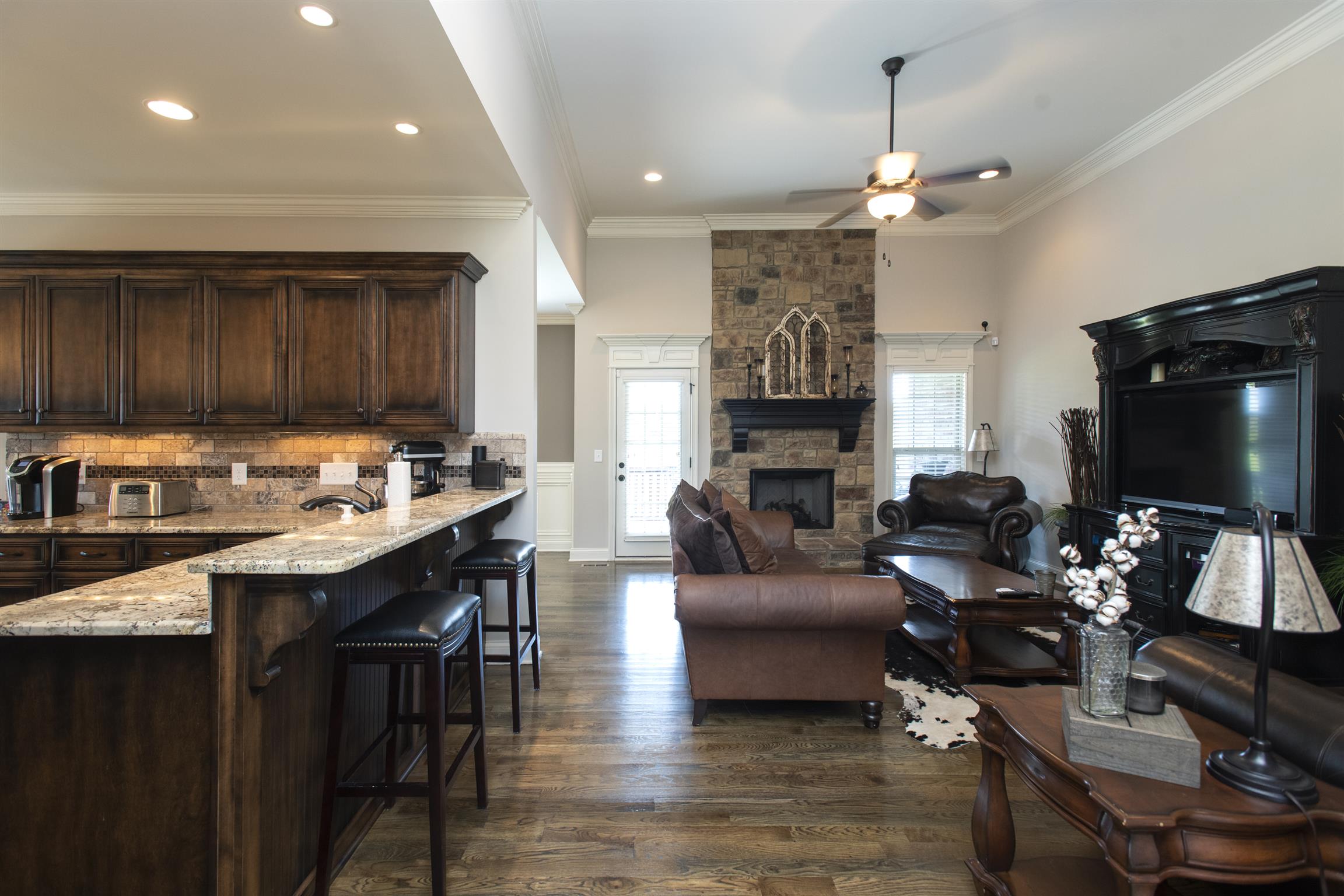 580 Academy Road Lebanon, TN 37087 - Photo 8 of 30 a living room with fireplace furniture and a flat screen tv
