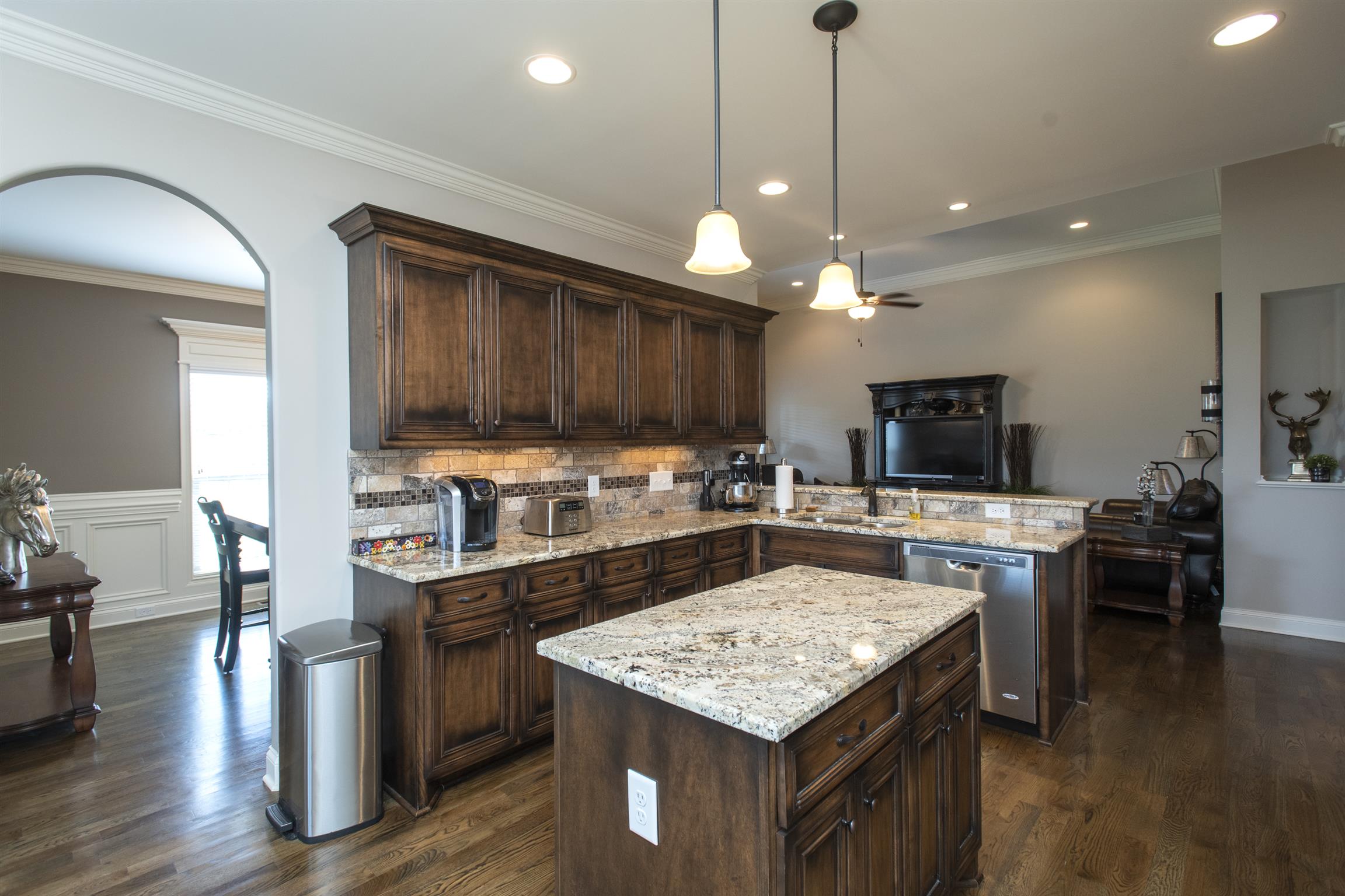 580 Academy Road Lebanon, TN 37087 - Photo 10 of 30 a kitchen with a stove a cabinets and wooden floor