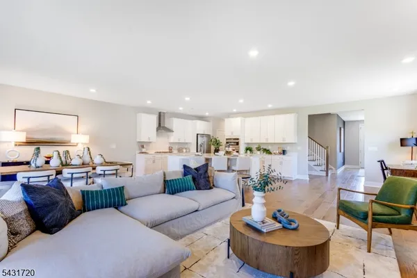 a living room with furniture and a table