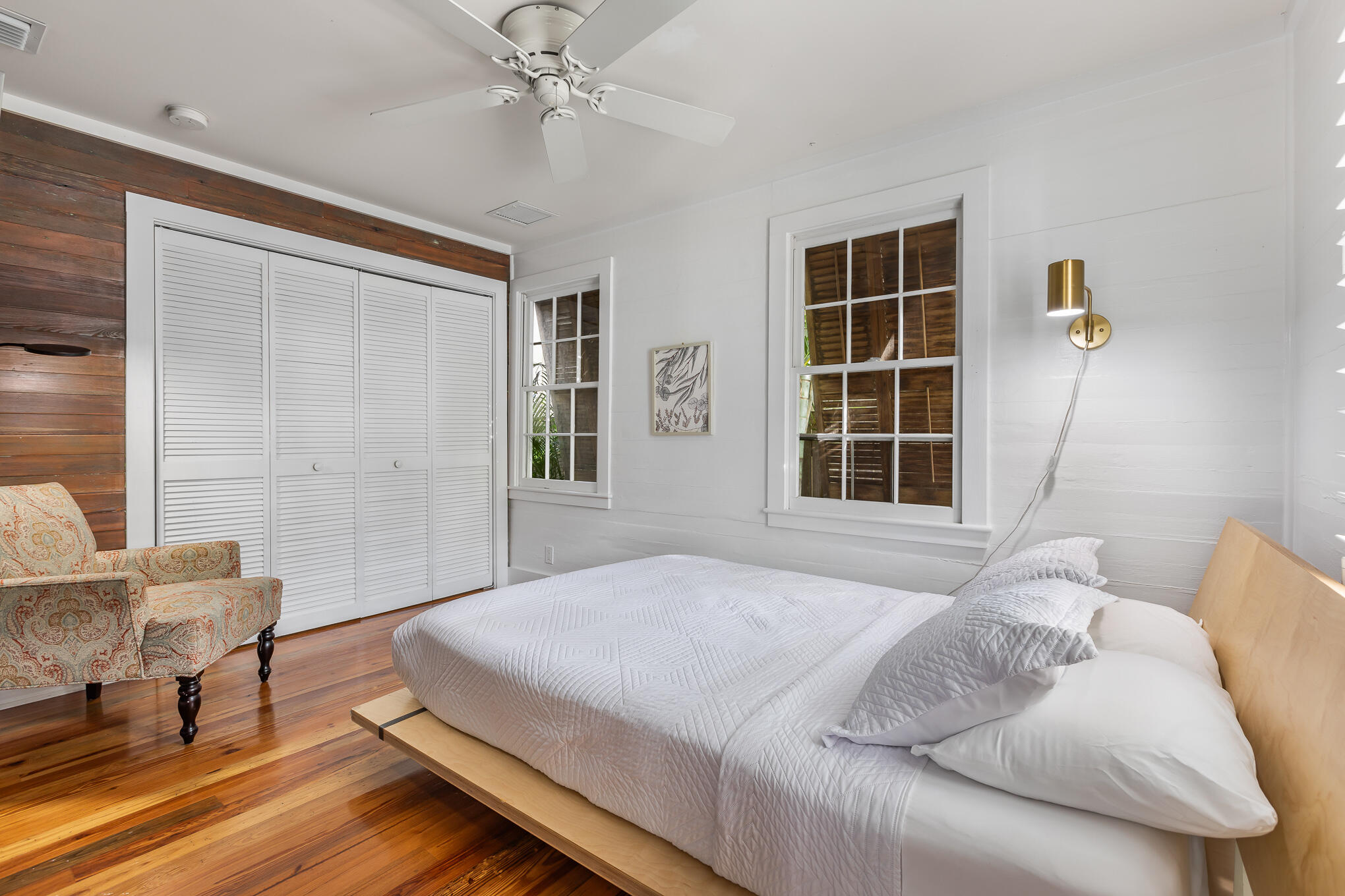 819 Elizabeth Street Key West, FL 33040 - Photo 13 of 28 a bedroom with a bed and a window