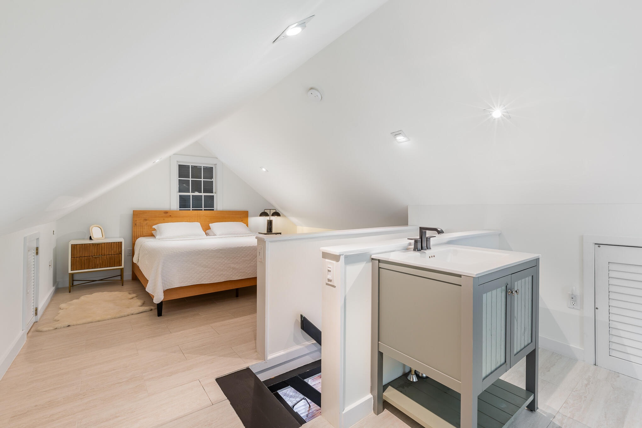 819 Elizabeth Street Key West, FL 33040 - Photo 18 of 28 a bedroom with a bed and a desk