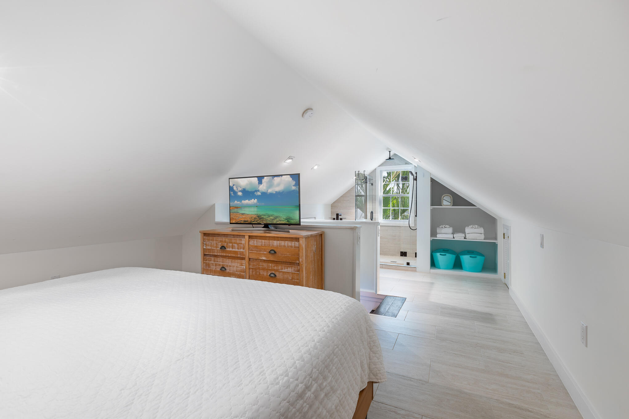 819 Elizabeth Street Key West, FL 33040 - Photo 19 of 28 a bedroom with a bed and a dresser