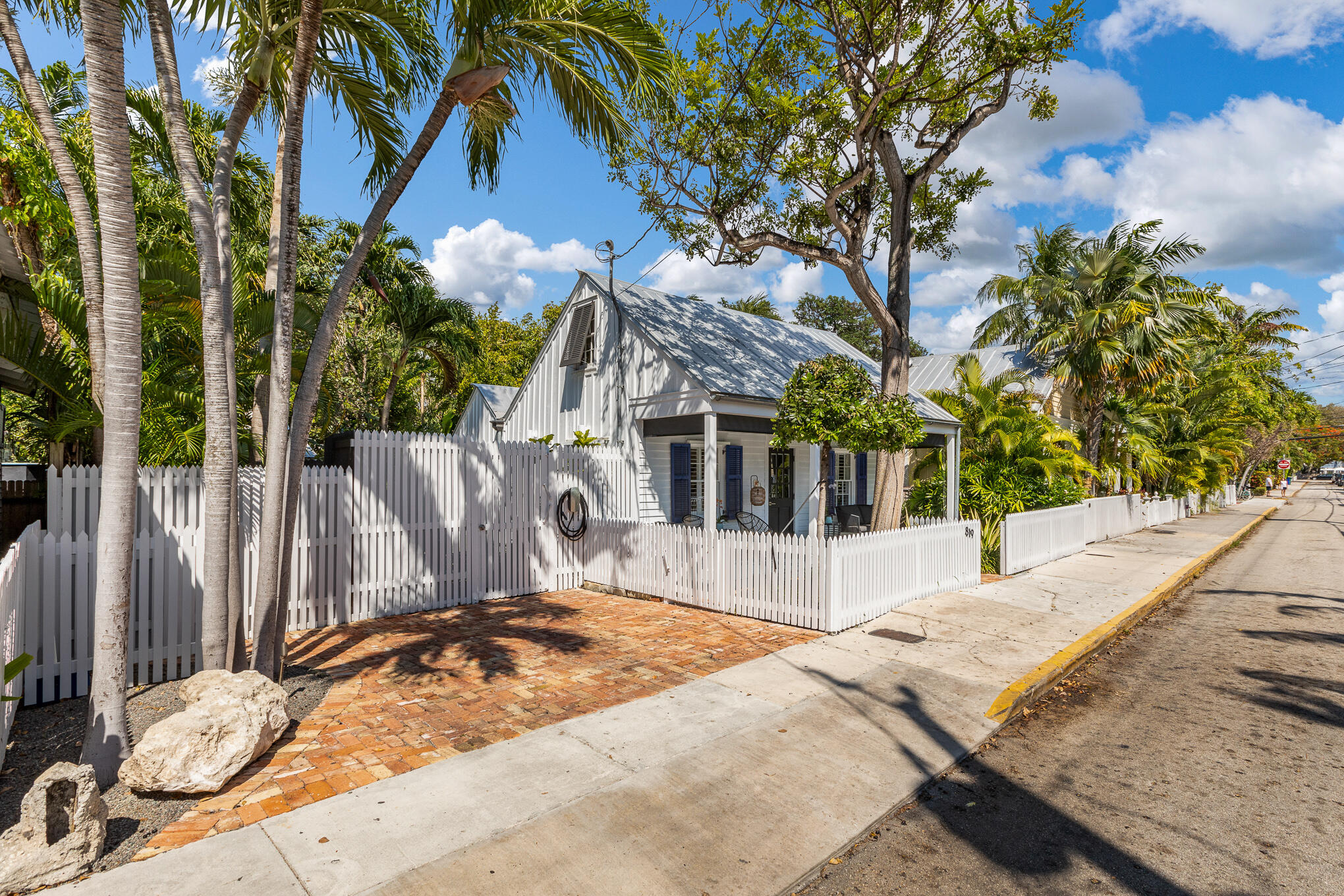 819 Elizabeth Street Key West, FL 33040 - Photo 2 of 28 a view of a backyard with palm tree