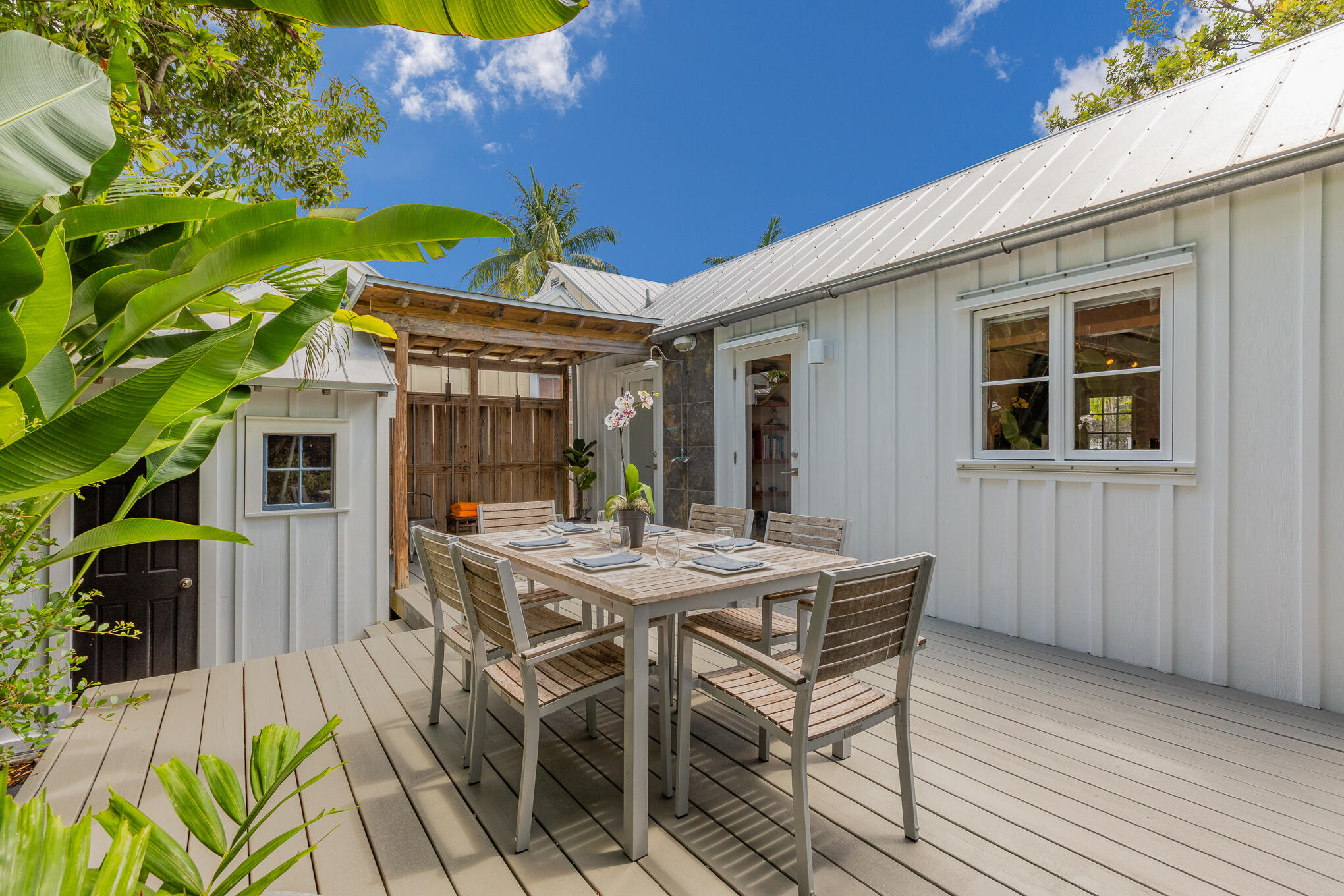 819 Elizabeth Street Key West, FL 33040 - Photo 26 of 28 a view of a house with backyard and sitting area