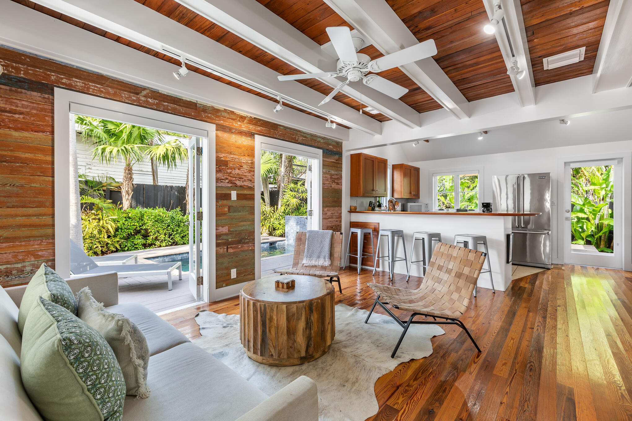 819 Elizabeth Street Key West, FL 33040 - Photo 5 of 28 a living room with furniture and a large window