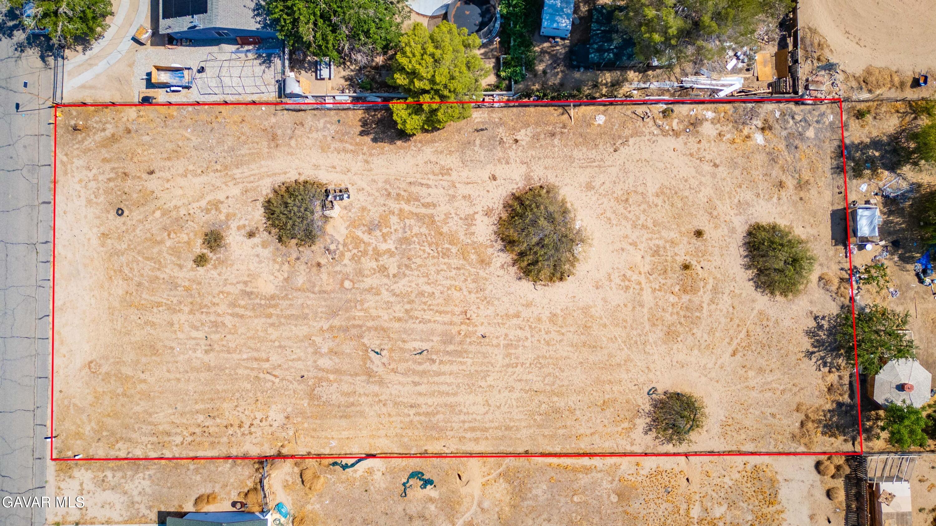 St Street East Palmdale, CA 93591 - Photo 11 of 14 a view of outdoor space with swimming pool