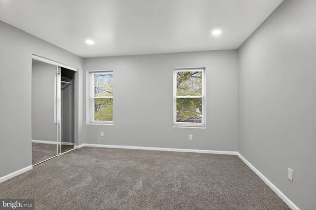 an empty room with windows