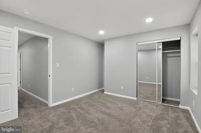 an empty room with a workbench