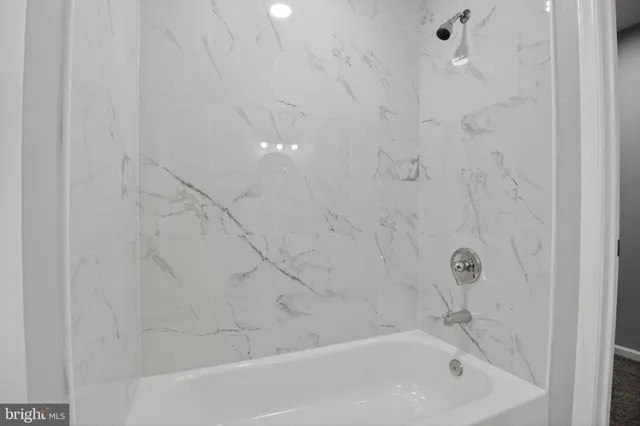 a bathroom with a toilet and a sink