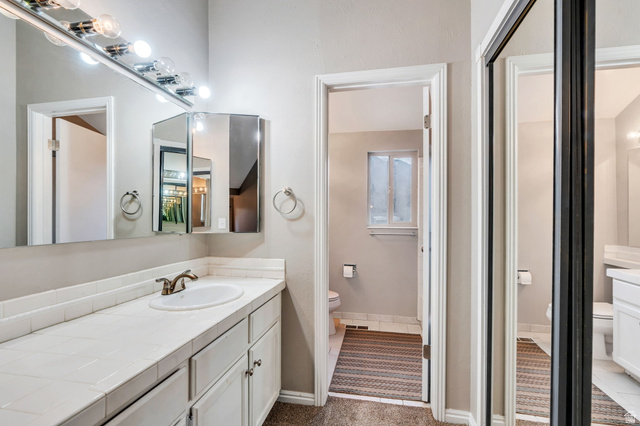 3221 North Shadowbrook Circle Provo, UT 84604 - Photo 12 of 29 Full bathroom with toilet and vanity