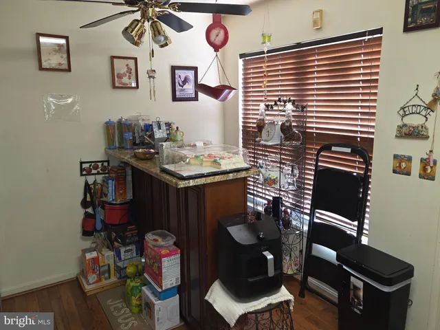 a bathroom with a sink mirror and vanity