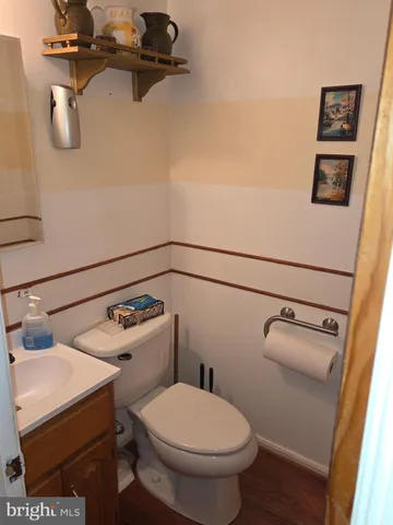 a bathroom with a toilet and a sink
