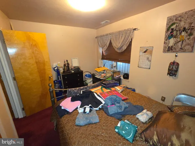 a living room with furniture and rug