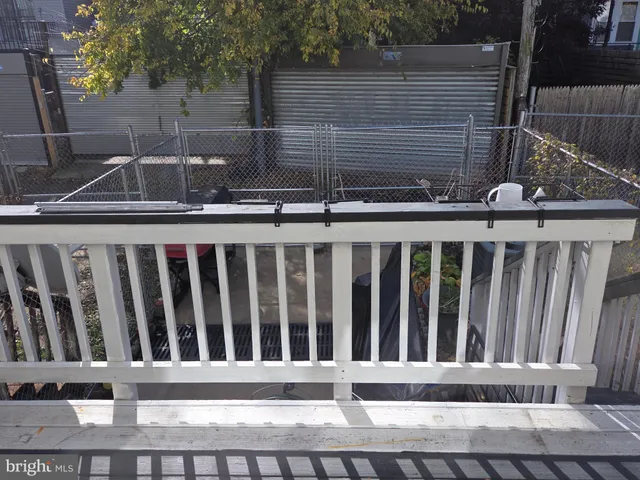 a view of a wooden fence