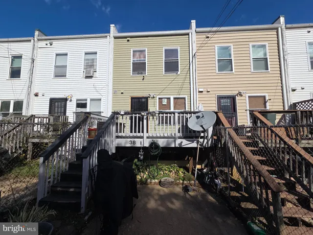 a view of a house with roof deck