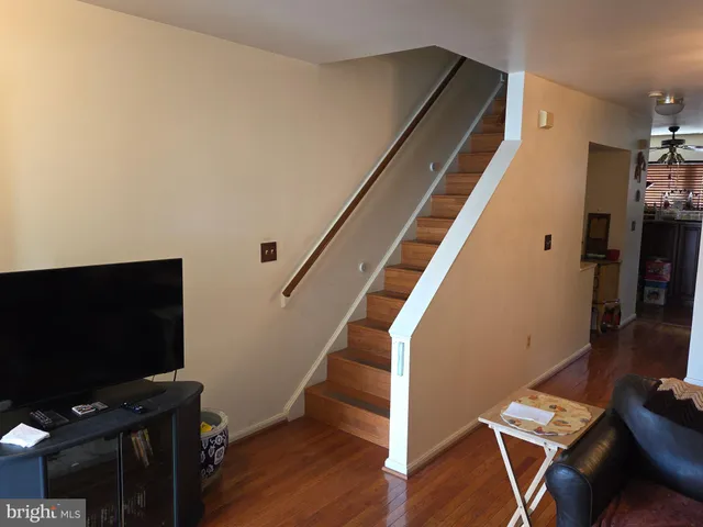 a view of livingroom with furniture and wooden floor
