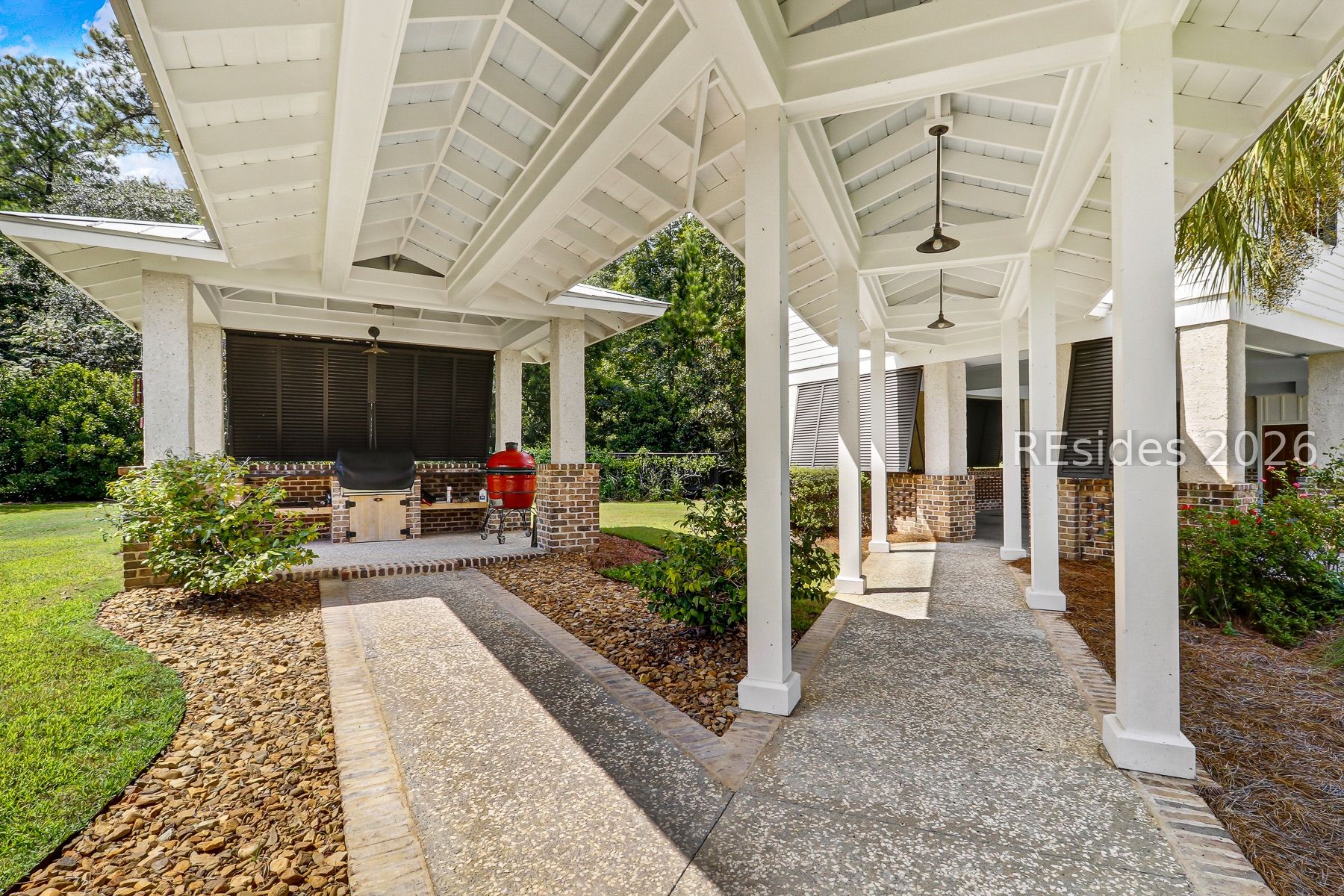 165 Golda Drive Ridgeland, SC 29936 - Photo 59 of 100 Walkway to Carriage House and Outdoor Kitchen