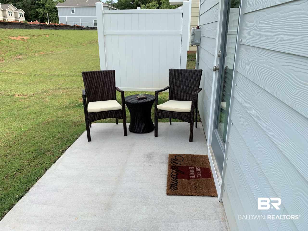 25806 Pollard Road, Unit 66 Daphne, AL 36526 - Photo 27 of 30 Back Patio
