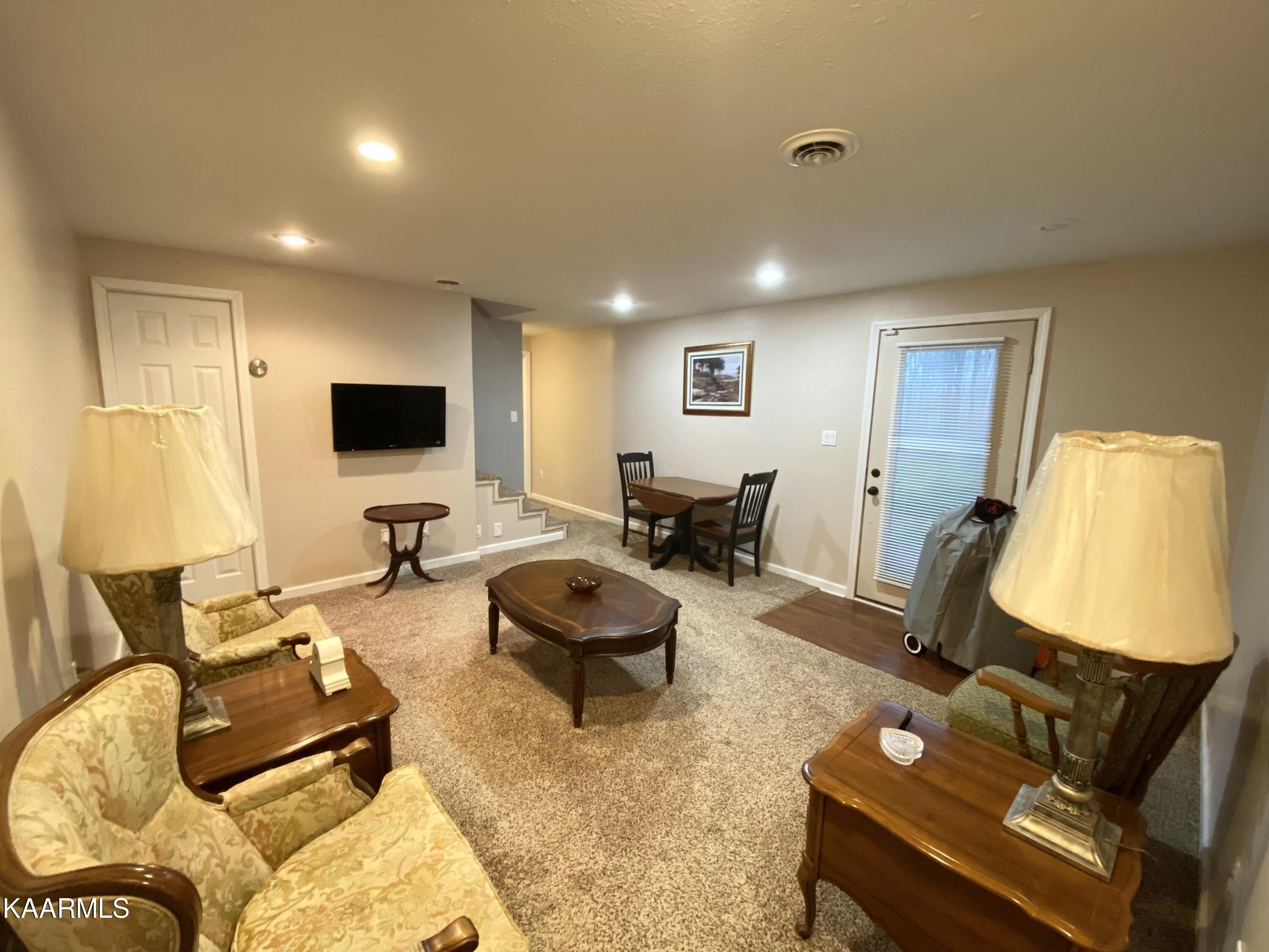 3430 Creston Road Crossville, TN 38571 - Photo 32 of 35 a living room with furniture and a flat screen tv