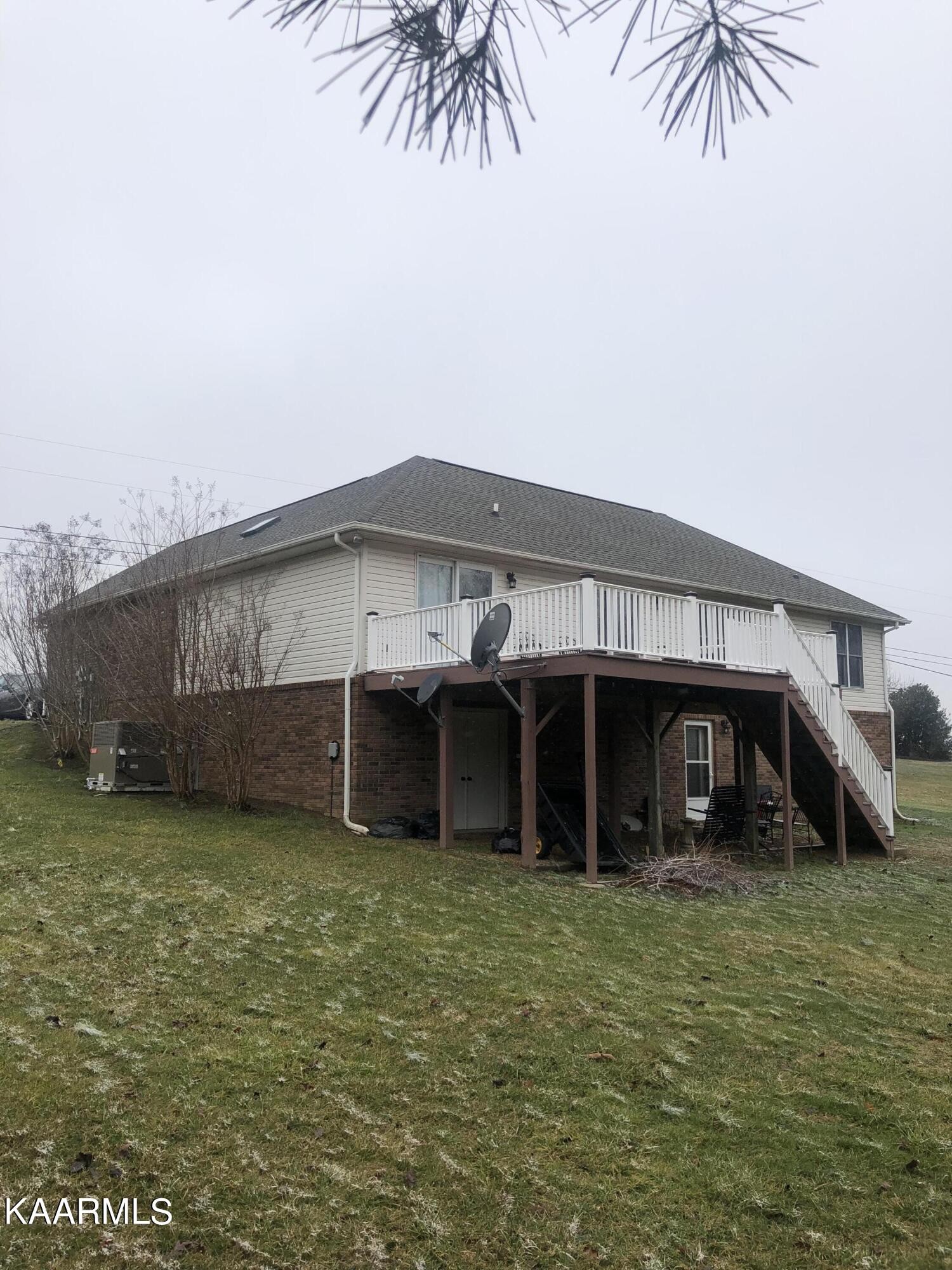 3430 Creston Road Crossville, TN 38571 - Photo 5 of 35 a view of a house with a garden