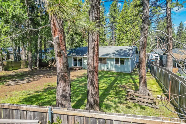 a view of an empty room with a staircase
