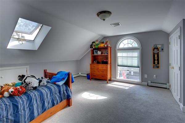 4 Longfellow Road Marblehead, MA 01945 - Photo 12 of 12 a bedroom with furniture and a window
