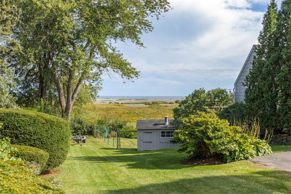 4 Longfellow Road Marblehead, MA 01945 - Photo 3 of 12 a view of a big yard with large trees