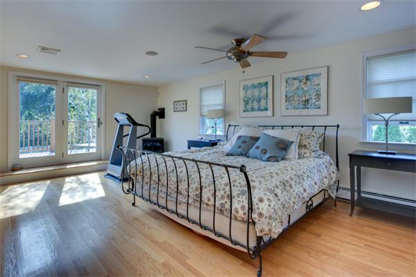 4 Longfellow Road Marblehead, MA 01945 - Photo 9 of 12 a bedroom with a bed and a large window