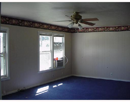 4222 Cott Street Corpus Christi, TX 78411 - Photo 3 of 5 an empty room with a window