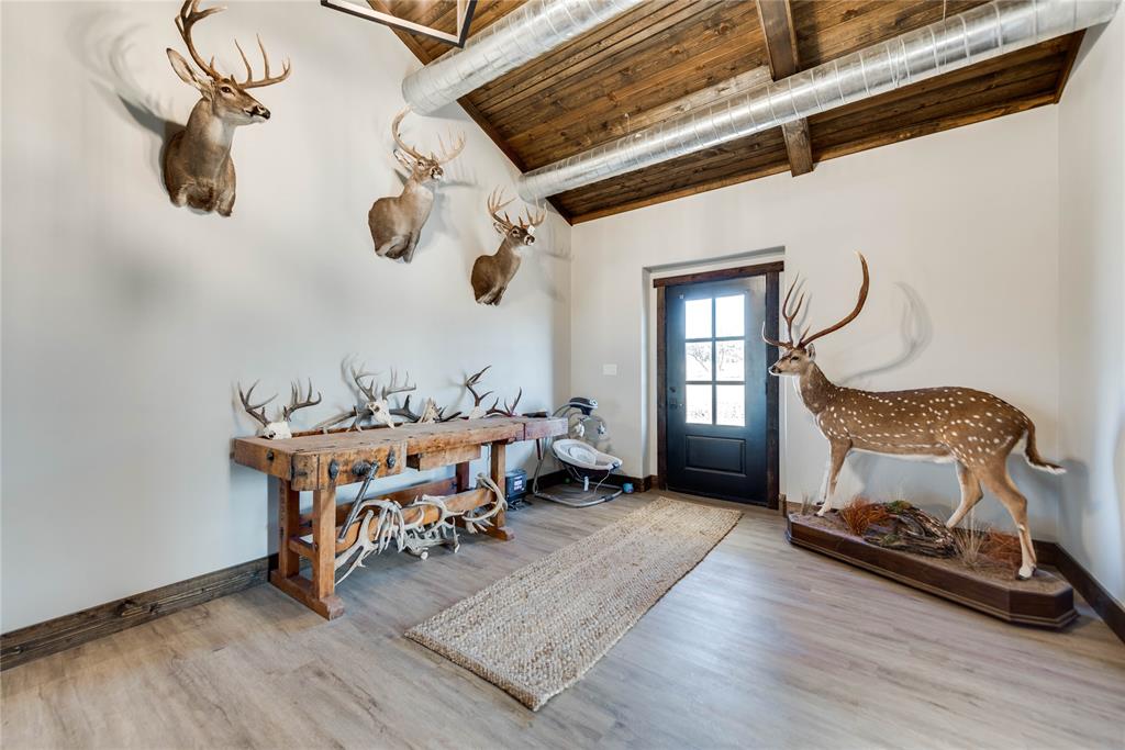 2527 Sutton County Road Ozona, TX 76943 - Photo 14 of 39 a bedroom with furniture and a window
