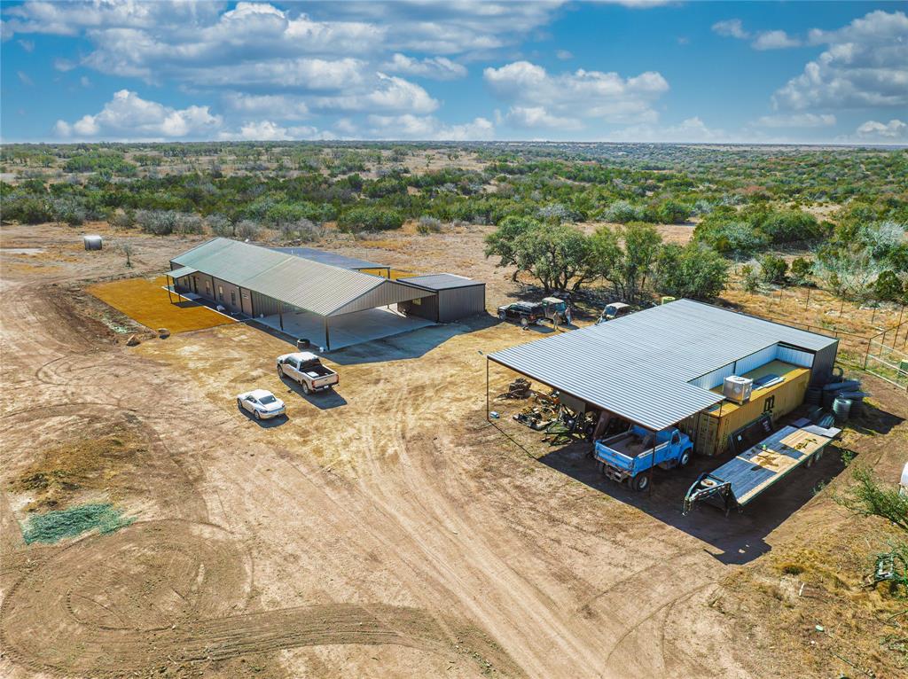 2527 Sutton County Road Ozona, TX 76943 - Photo 2 of 39 an aerial view of a house with a yard
