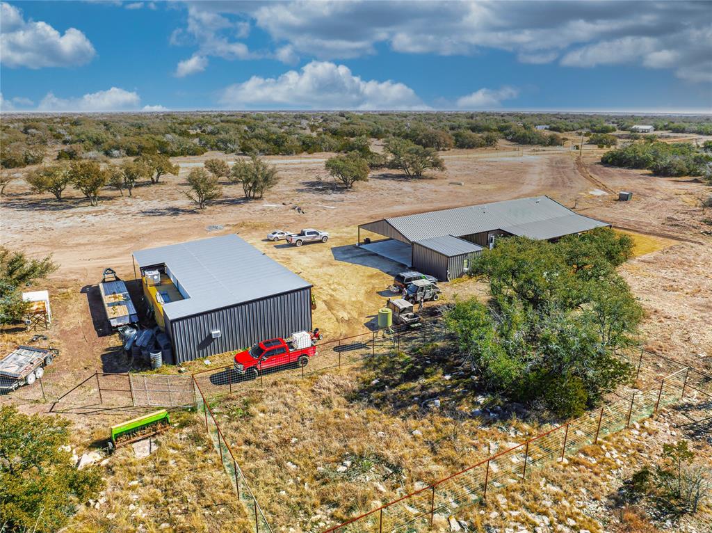 2527 Sutton County Road Ozona, TX 76943 - Photo 4 of 39 an aerial view of a houses