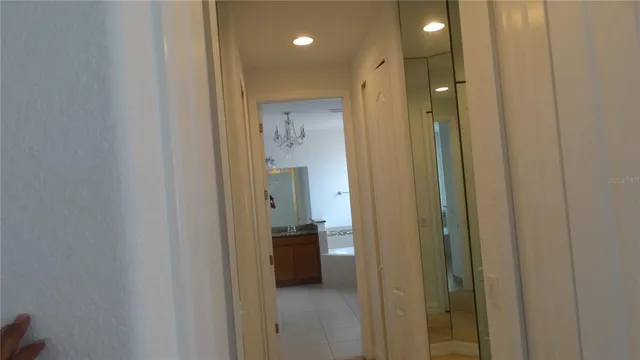 a en suite bathroom with a sink and a mirror