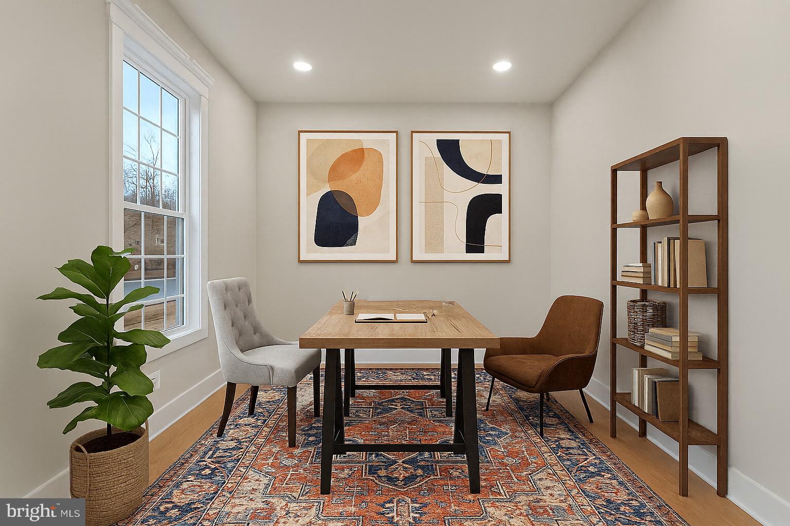 17 Vinter Lane Pasadena, MD 21122 - Photo 15 of 40 a view of a workspace with furniture and a potted plant