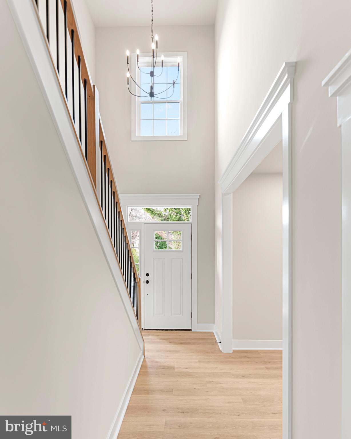 17 Vinter Lane Pasadena, MD 21122 - Photo 19 of 40 a view of an entryway with wooden floor