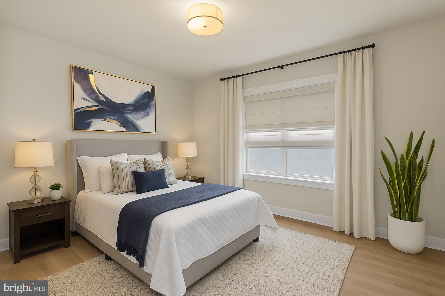 17 Vinter Lane Pasadena, MD 21122 - Photo 27 of 39 a bedroom with a bed and a painting on the wall