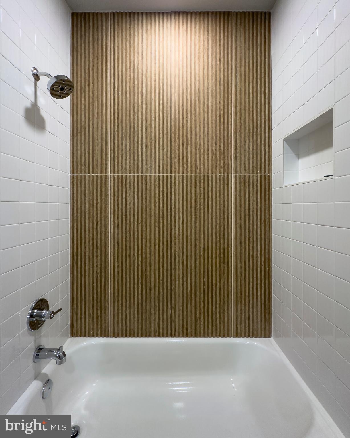 17 Vinter Lane Pasadena, MD 21122 - Photo 32 of 40 a bathroom with a shower