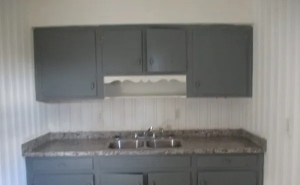 a view of a room with a fan