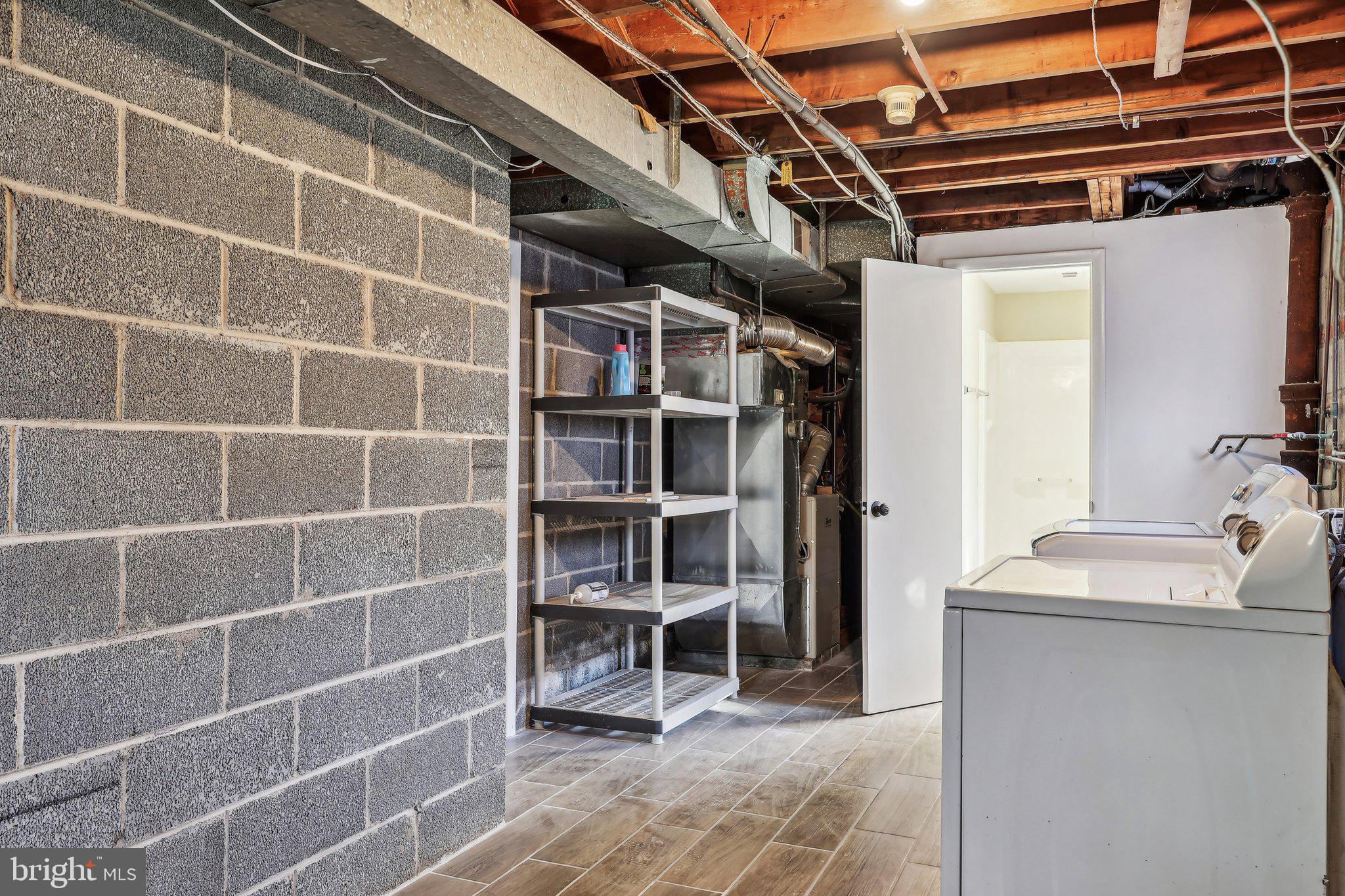 1726 Green Valley Road Havertown, PA 19083 - Photo 14 of 18 Laundry Room with Bathroom