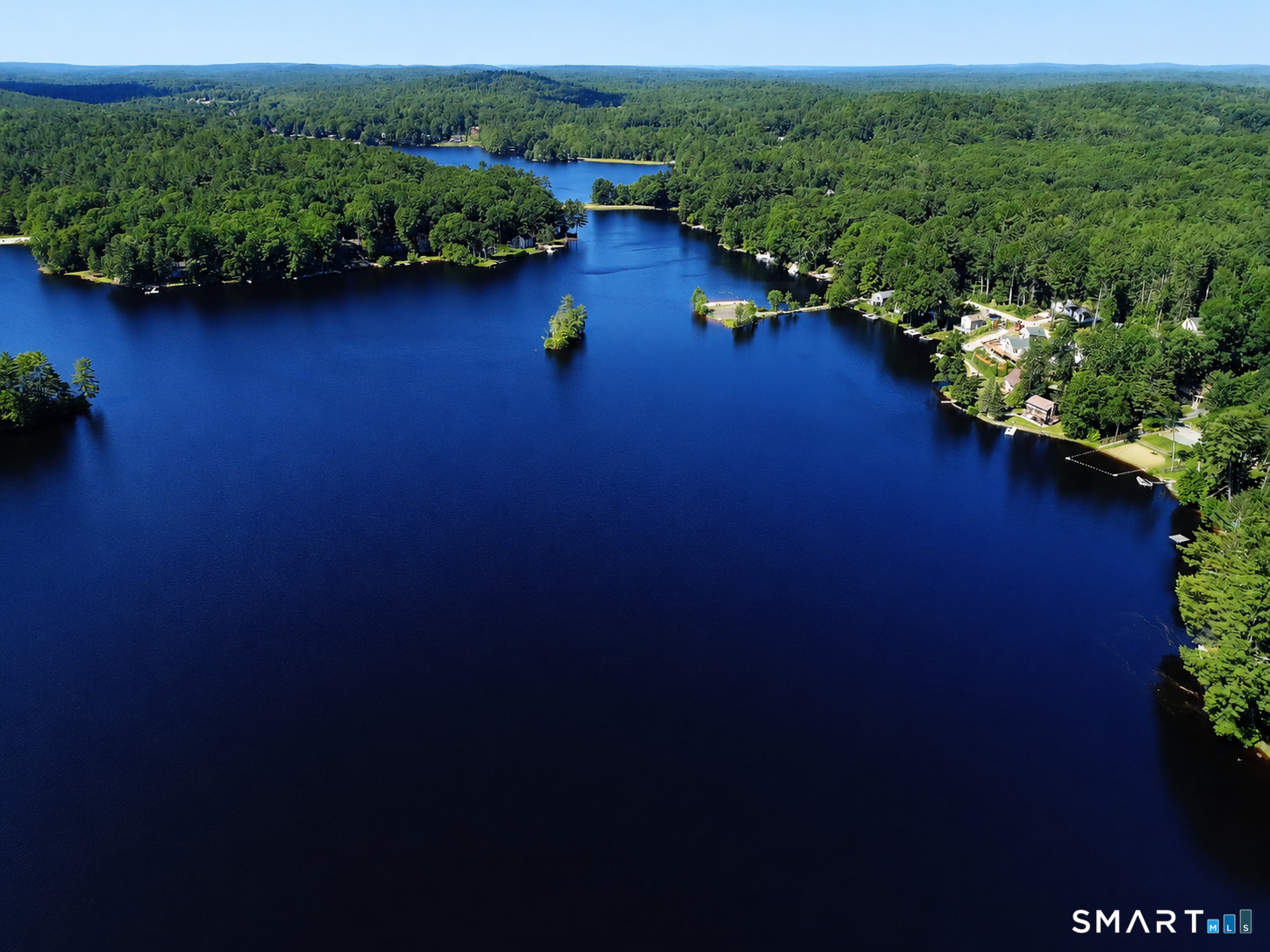 40 Old Sawmill Road Woodstock, CT 06282 - Photo 2 of 34 This property also includes coveted Lake Bunggee rights, offering year-round recreation on a private 111-acre lake community with 2 boat launches and 5 beaches. Enjoy boating, waterskiing, fishing, swimming, and more