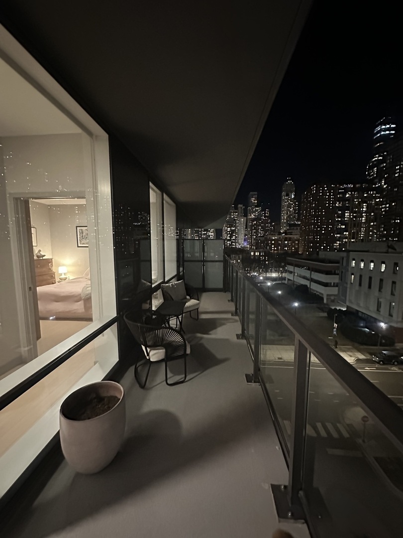 920 North Wells Street, Unit 612 Chicago, IL 60610 - Photo 11 of 14 a lobby with furniture and floor to ceiling window