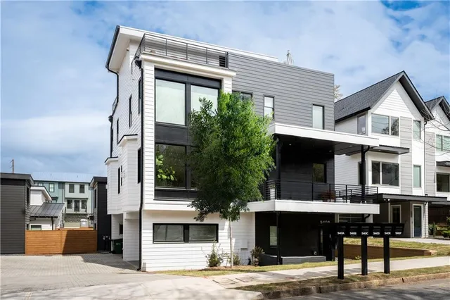 a front view of a house with garage