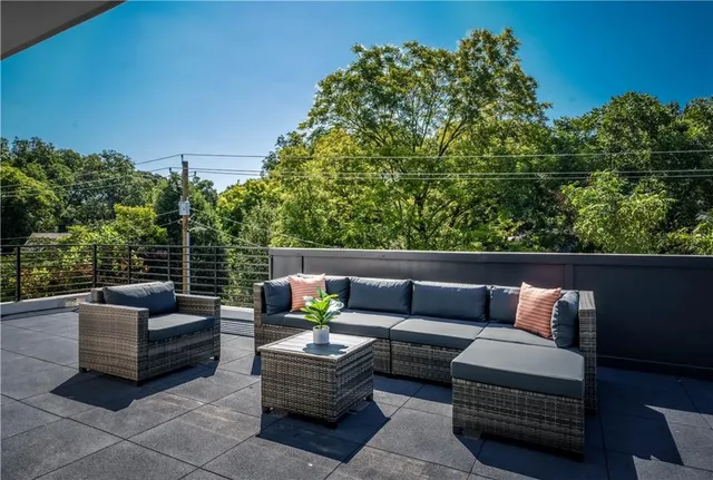 a outdoor living space with furniture and garden view