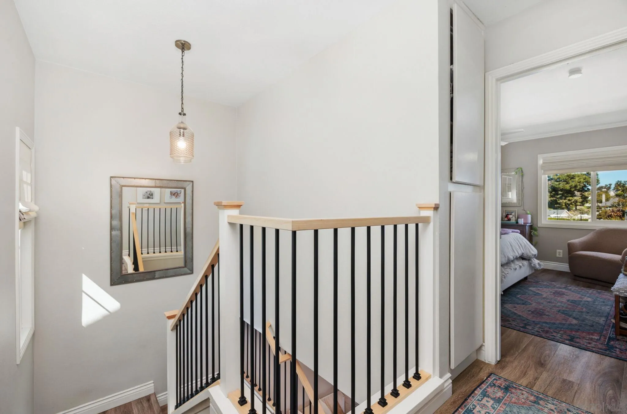 1971 Azure Way Encinitas, CA 92024 - Photo 16 of 30 a view of a hallway with windows and entryway