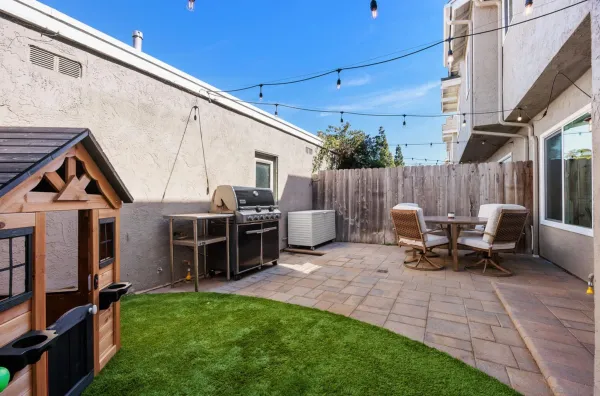a view of yard with patio