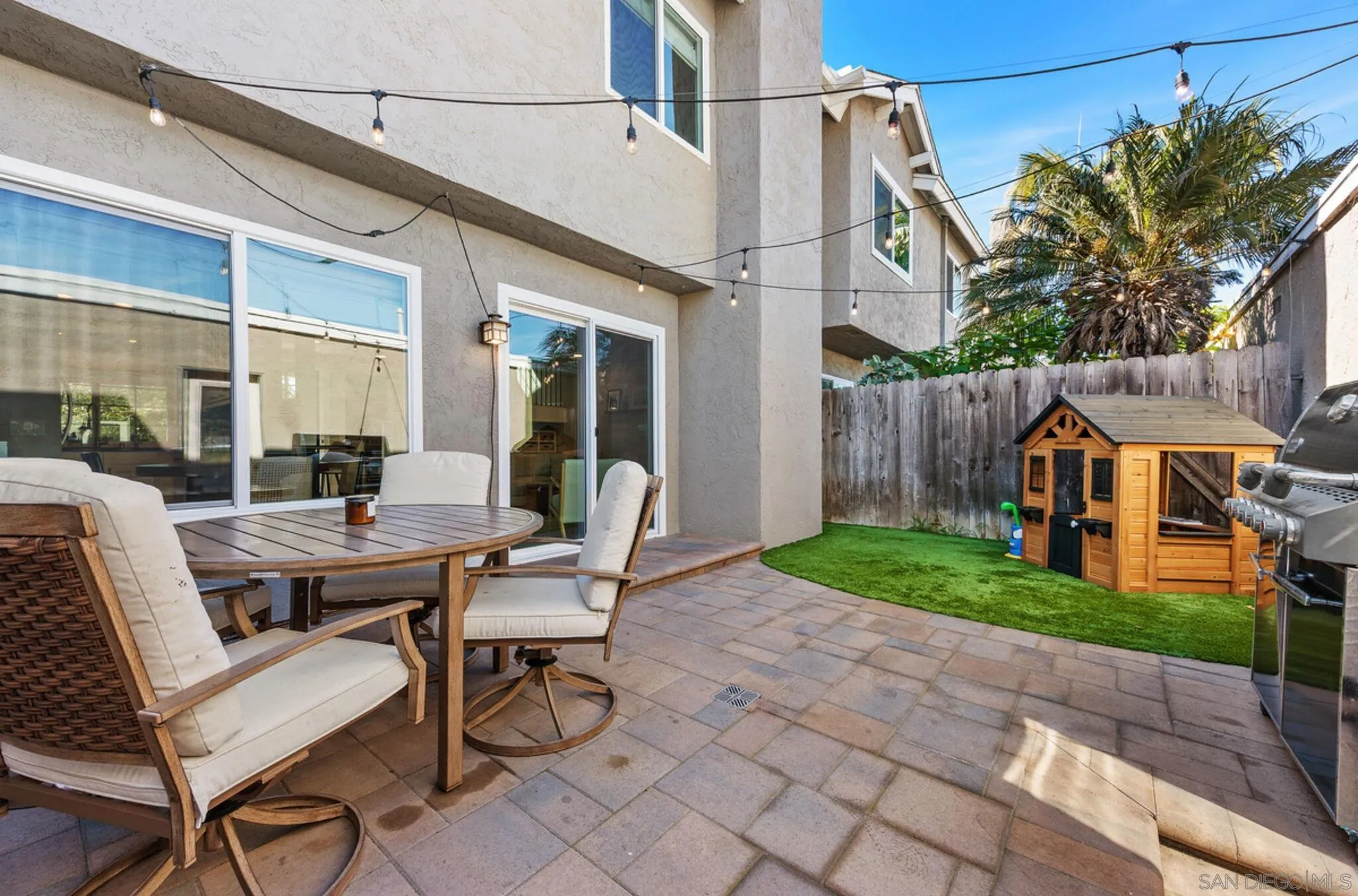 1971 Azure Way Encinitas, CA 92024 - Photo 26 of 30 a view of a patio with table and chairs and potted plants