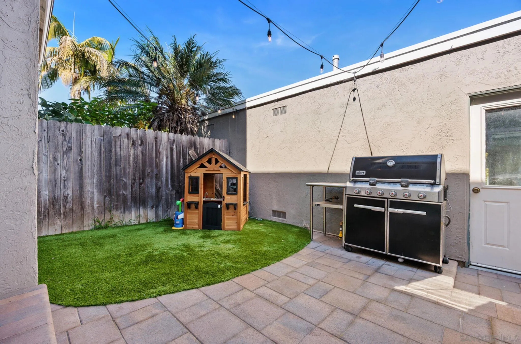1971 Azure Way Encinitas, CA 92024 - Photo 27 of 30 a view of a house with a backyard