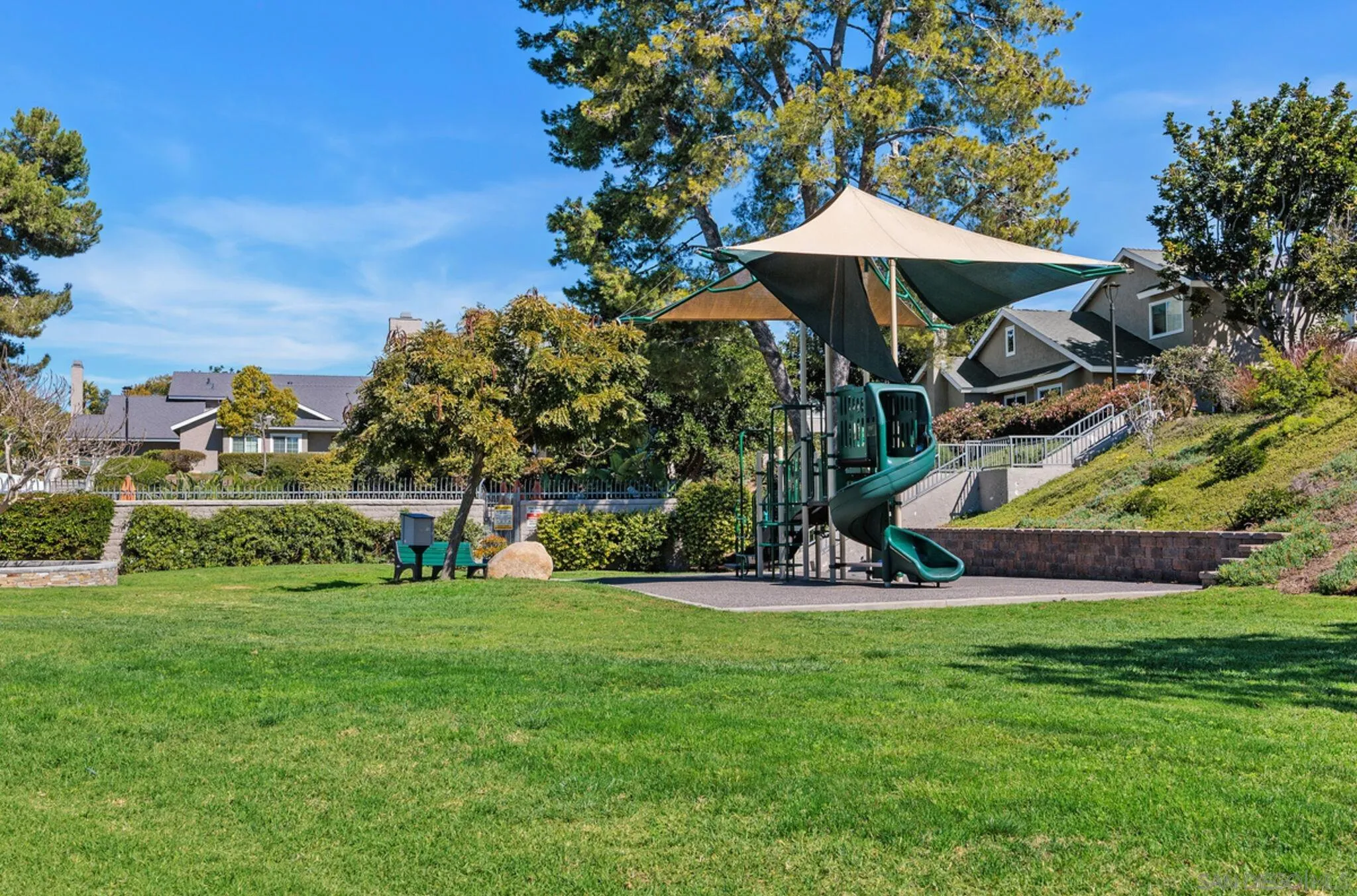1971 Azure Way Encinitas, CA 92024 - Photo 30 of 30 a view of a table and chairs under an umbrella