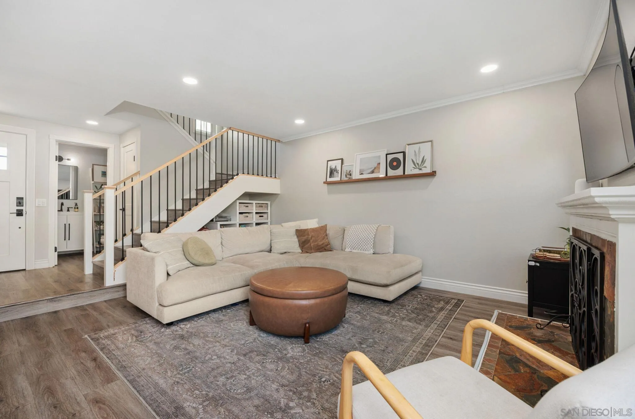 1971 Azure Way Encinitas, CA 92024 - Photo 7 of 30 a living room with furniture and a flat screen tv